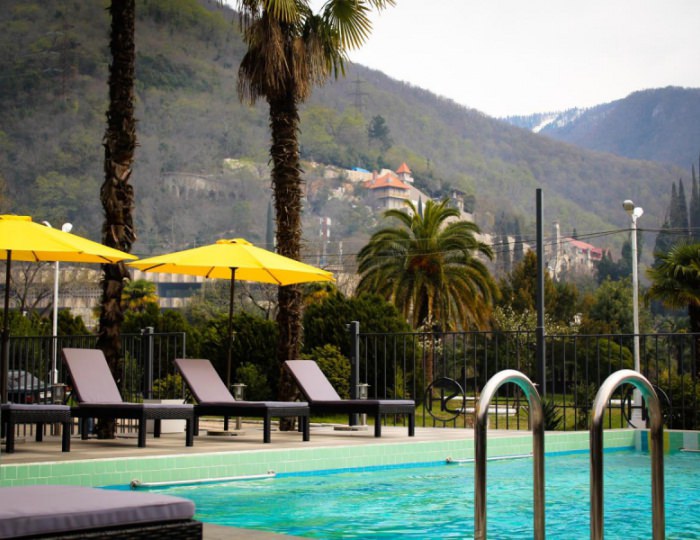 Открытый подогреваемый бассейн - Отель Sunrise Garden Hotel / Санрайз Гарден